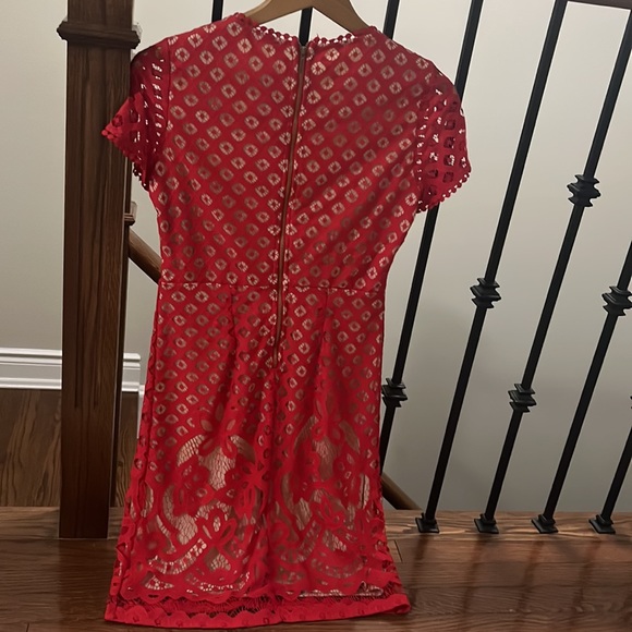 Red fancy cocktail dress, size Xs. Flattering fit. New tags still on. - Picture 2 of 4